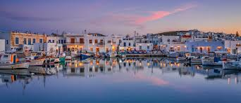 Evening view of Naoussa Paros port for yacht and private transfers