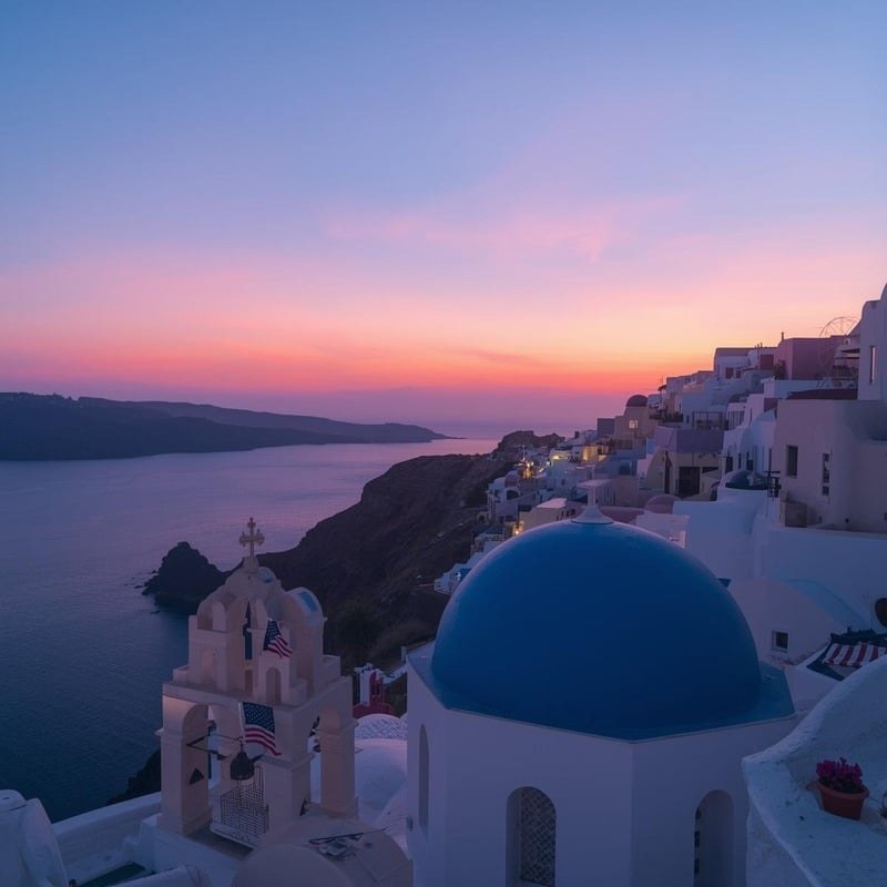 Oia Santorini blue dome sunset after luxury helicopter arrival