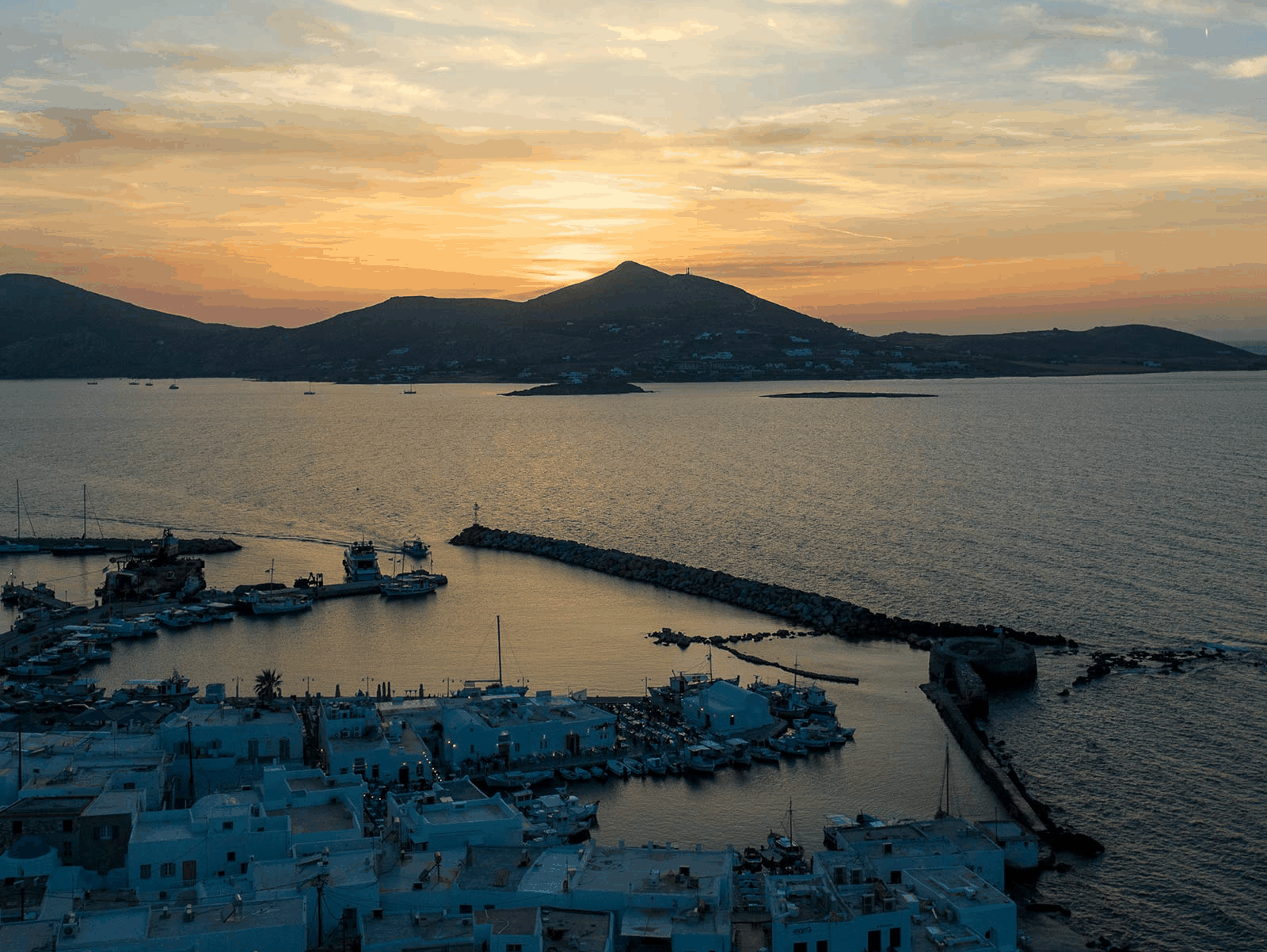 Sunset view of Naoussa Paros for luxury travel in Greece